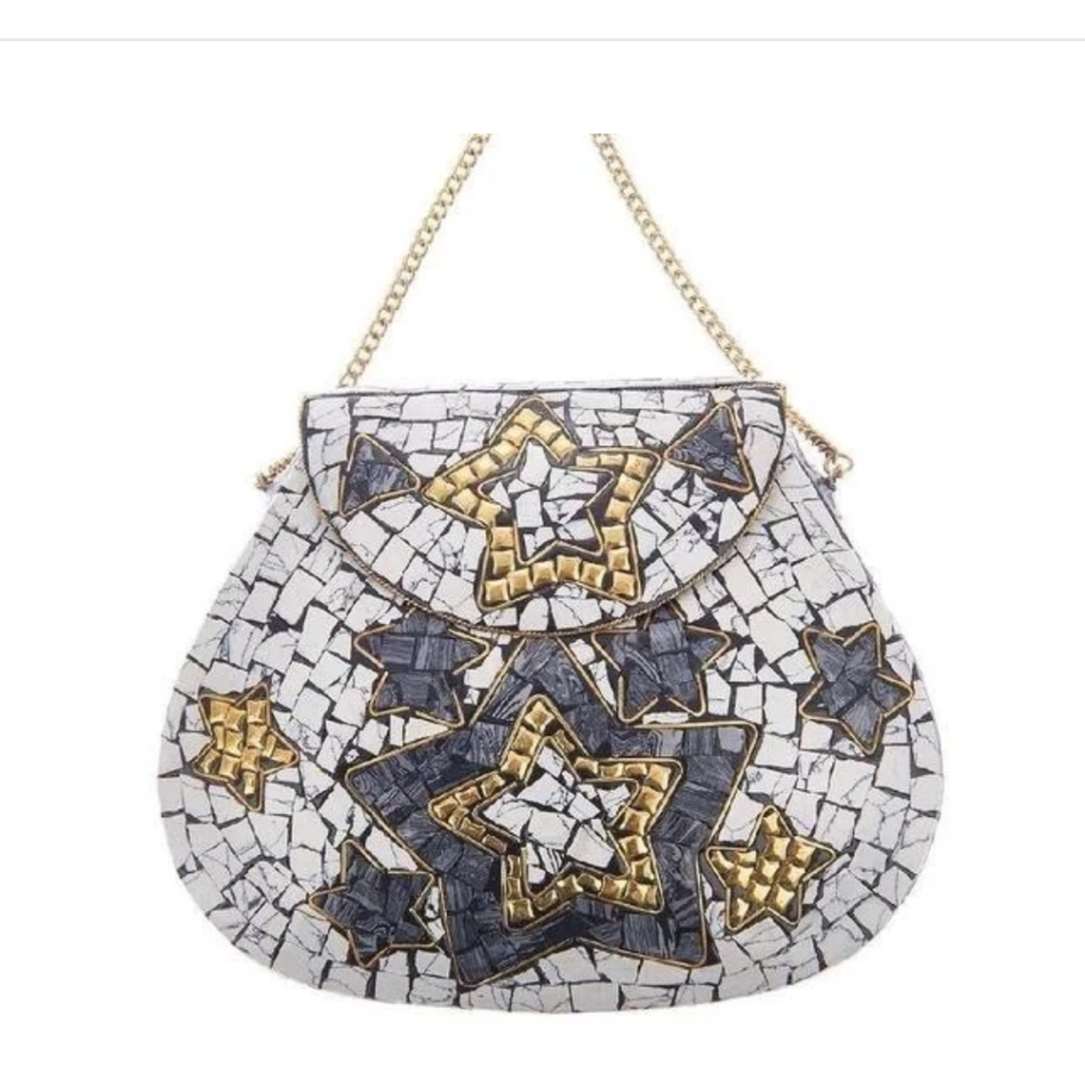 From St. Xavier Starry Clutch